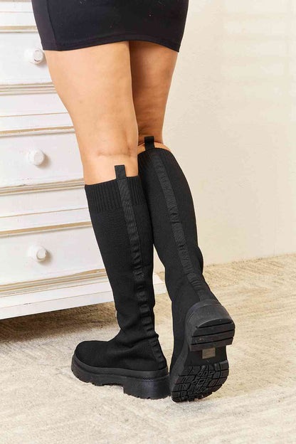 Elegante und detaillierte stützende Stiefel